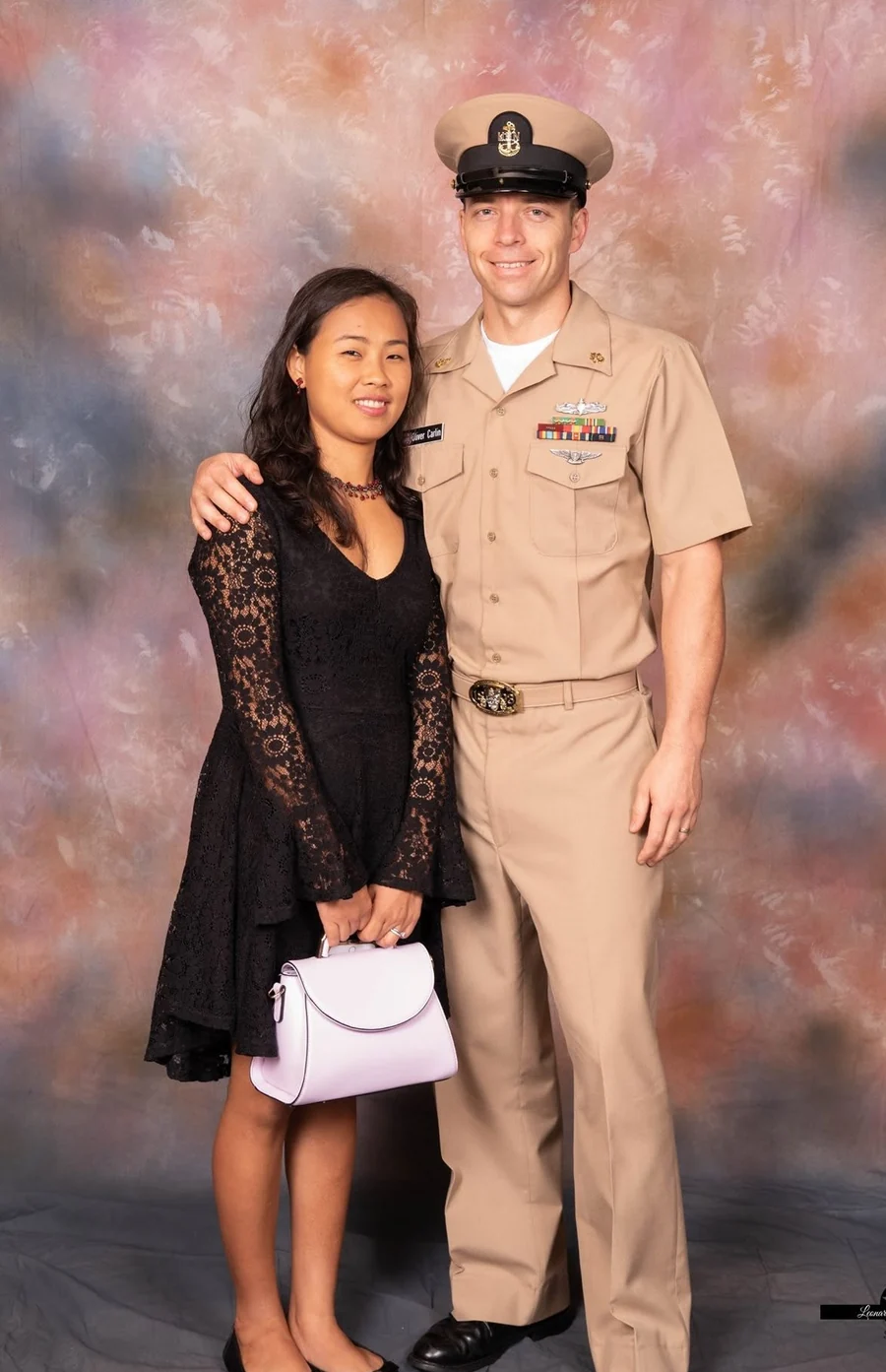 Oliver in Navy Chief khaki uniform with his wife